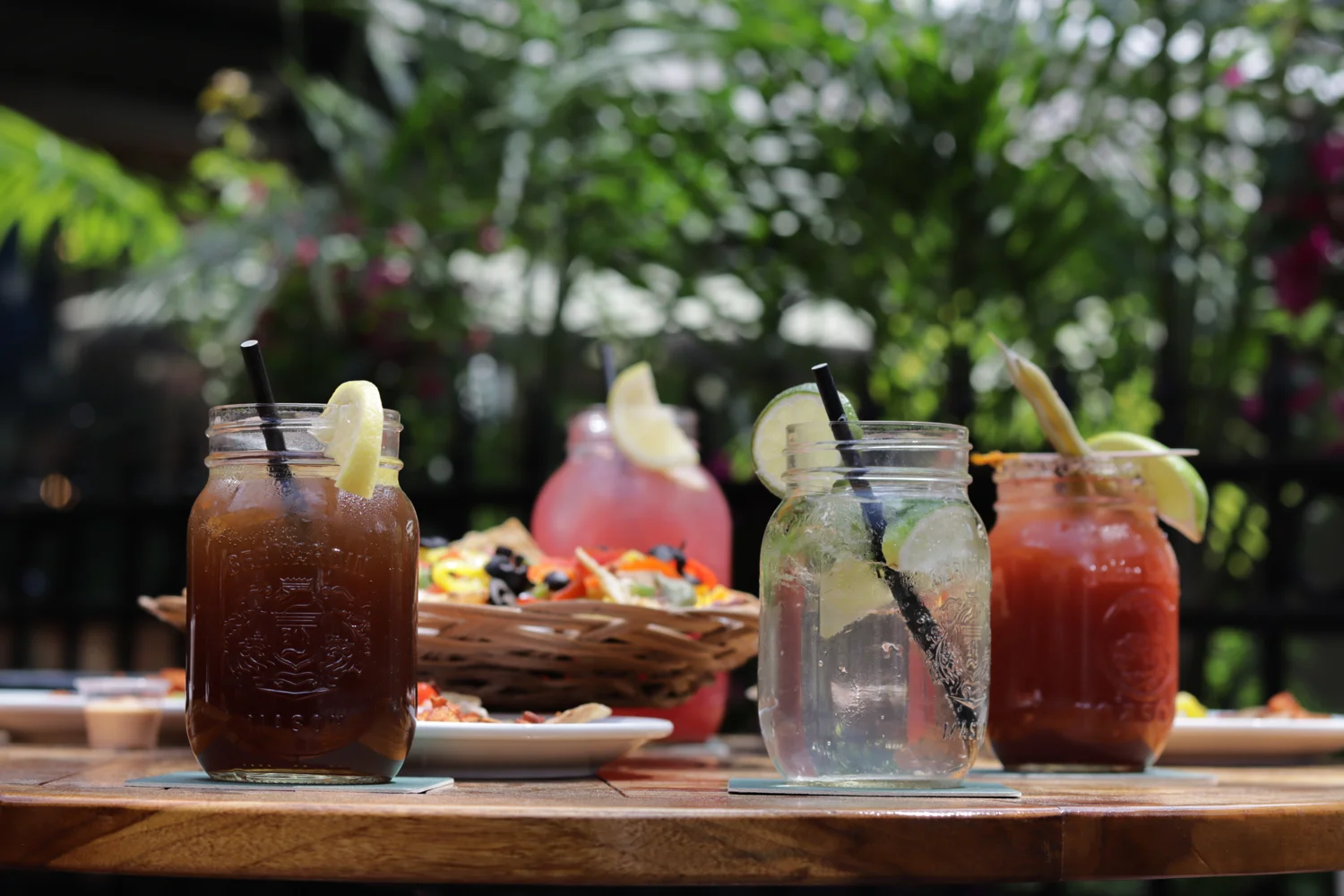 Colourful drinks and nachos on a sunny Lieutenant’s Pump patio table