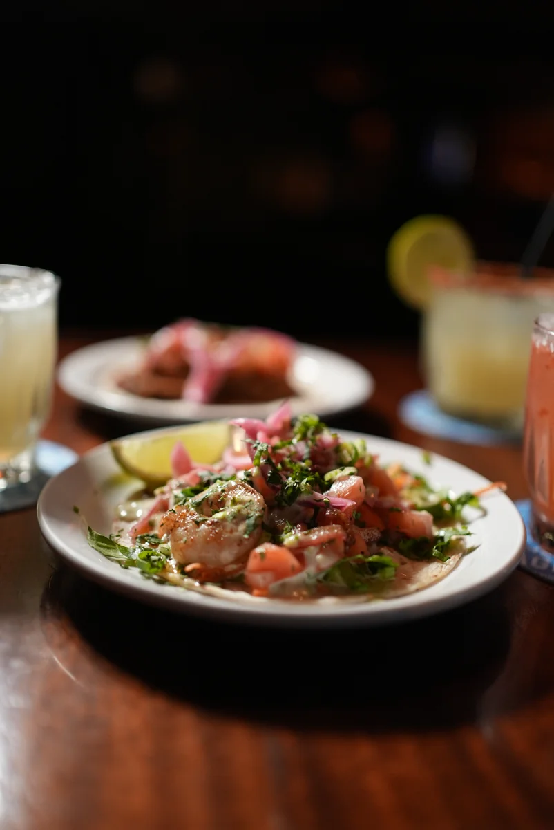 Shrimp taco with fresh toppings and lime, photographed at Lieutenant’s Pump